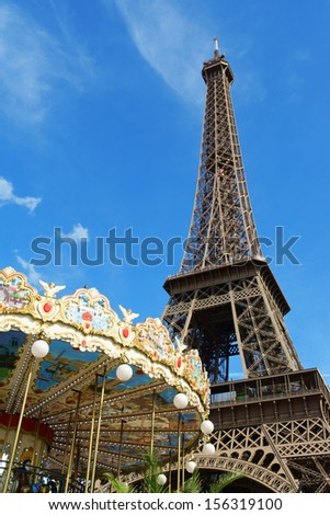 The Eiffel Tower (Tour Eiffel) against a blue summer sky in Paris, France. It was built between 1887 and 1889 for the World\'s Fair (Expo 1889).