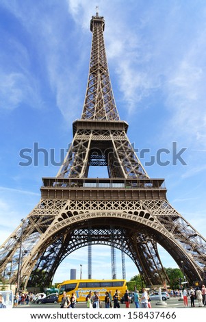 PARIS, FRANCE - AUGUST 17: the Eiffel Tower (Tour Eiffel) on August 17, 2013 in Paris, France against a blue summer sky. It was built between 1887 and 1889 for the World\'s Fair (Expo 1889).