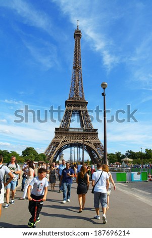 PARIS, FRANCE - AUGUST 17: the Eiffel Tower (Tour Eiffel) against a blue summer sky on August 17, 2013 in Paris, France. It was built between 1887 and 1889 for the World\'s Fair (Expo 1889).