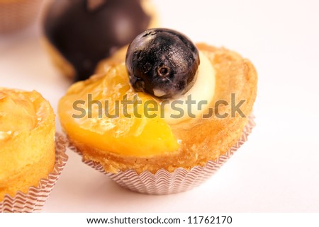 Close-up of some assorted delicious tea cakes isolated on white