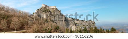 Panoramic view of San Leo also known as Montefeltro and its fortress built upon a 583 metres high rocky mount. The present structure was ordered by Federico da Montefeltro end of 15th century.