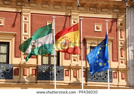 Flags of Andalusia, Spain and European Community at Palace of San Telmo, the seat of the presidency of the Andalusian Autonomous Government in Seville, Spain.