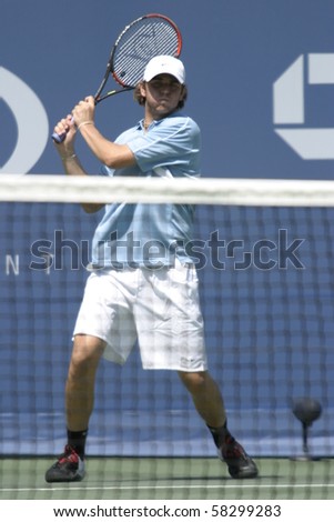 NEW YORK- JULY 31: Mardy Fish action against Marat Safin  July 20, 2004 in Flushing, NY. Safin won the match to advance on in the 2004 US Open.