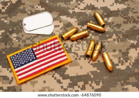 Pistol rounds,dog tags and US flag patch on ACU background