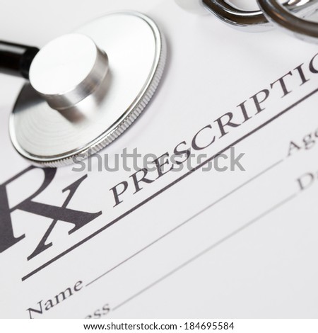 Medical ideas - blank prescription and stethoscope above it - 1 to 1 ratio