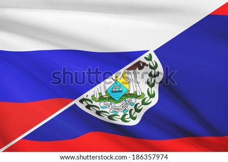 Flag of Russia and Belize blowing in the wind. Part of a series.