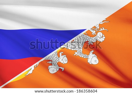 Flag of Russia and Bhutan blowing in the wind. Part of a series.