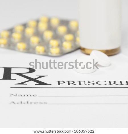 Medical prescription with pills on table - 1 to 1 ratio