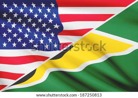 Flags of USA and Co-operative Republic of Guyana blowing in the wind. Part of a series.