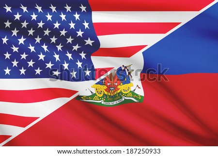 Flags of USA and Republic of Haiti blowing in the wind. Part of a series.