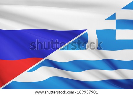 Flags of Russia and Hellenic Republic - Greece blowing in the wind. Part of a series.