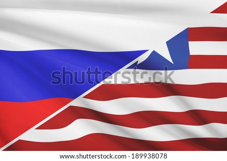 Flags of Russia and Republic of Liberia blowing in the wind. Part of a series.