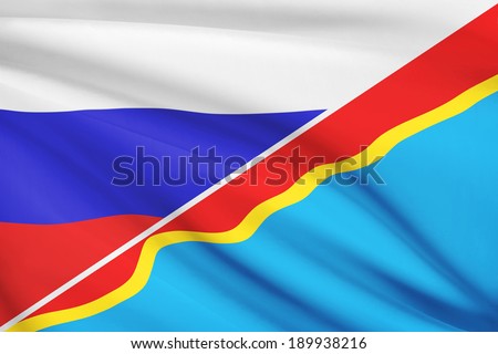 Flags of Russia and Democratic Republic of the Congo blowing in the wind. Part of a series.