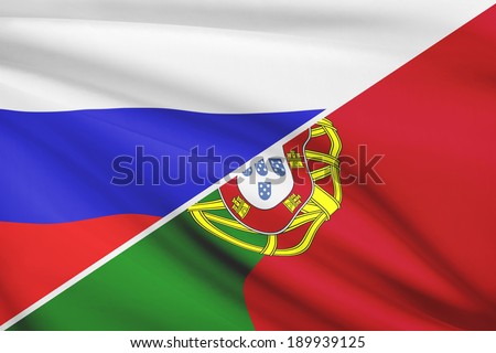 Flags of Russia and Portugal blowing in the wind. Part of a series.