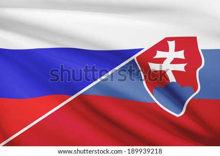 Flags of Russia and Slovak Republic - Slovakia - blowing in the wind. Part of a series.