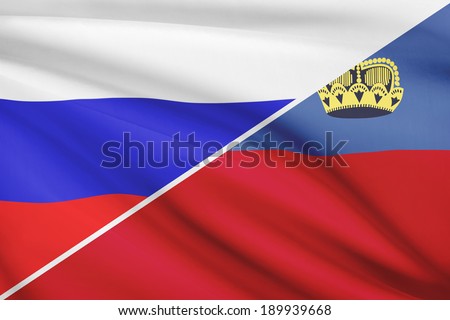 Flags of Russia and Principality of Liechtenstein blowing in the wind. Part of a series.