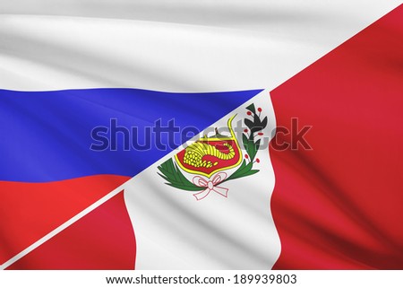 Flags of Russia and Republic of Peru blowing in the wind. Part of a series.