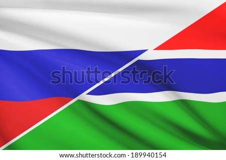 Flags of Russia and Republic of the Gambia blowing in the wind. Part of a series.