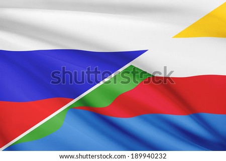 Flags of Russia and Union of the Comoros blowing in the wind. Part of a series.
