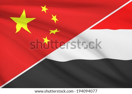 Flags of China and Republic of Yemen blowing in the wind. Part of a series.