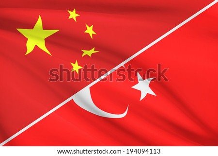 Flags of China and Republic of Turkey blowing in the wind. Part of a series.