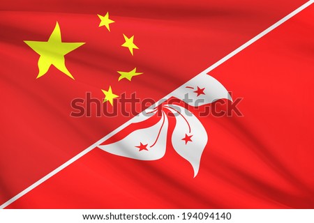 Flags of China and Hong Kong Special Administrative Region of the People\'s Republic of China blowing in the wind. Part of a series.