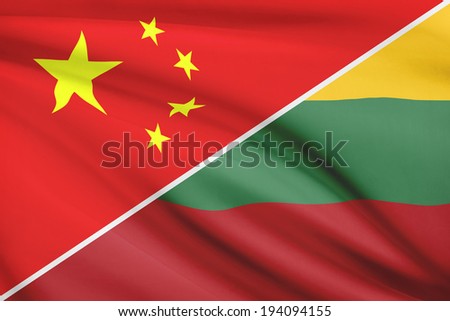 Flags of China and Republic of Lithuania blowing in the wind. Part of a series.