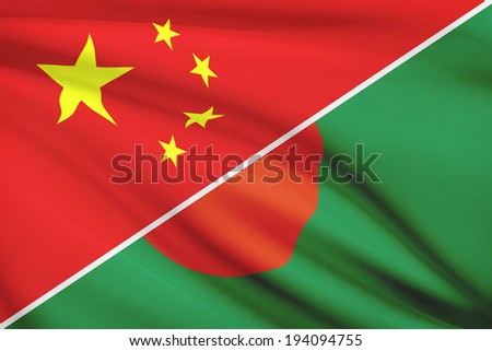 Flags of China and People\'s Republic of Bangladesh blowing in the wind. Part of a series.
