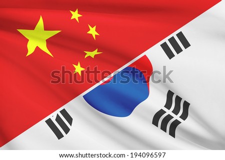 Flags of China and Republic of Korea blowing in the wind (South Korea). Part of a series.