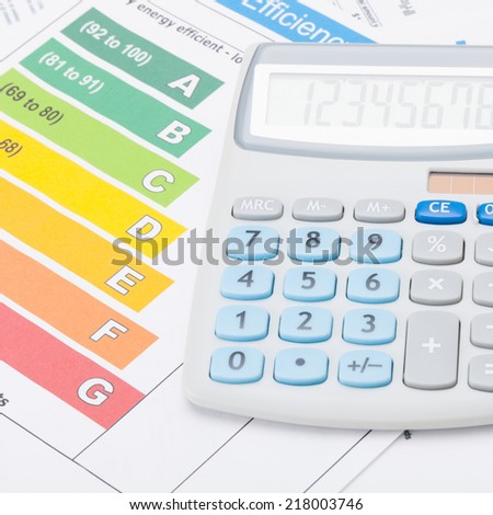 Calculator with energy efficiency chart - studio shot - 1 to 1 ratio