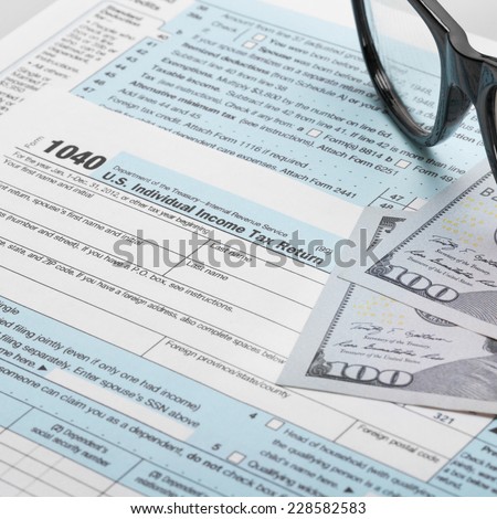 United States of America Tax Form 1040 with glasses