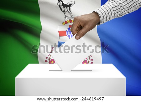 Voting concept - Ballot box with Canadian province flag on background - Yukon