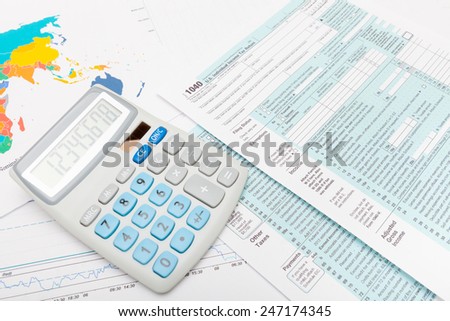 Calculator and US 1040 Tax Form