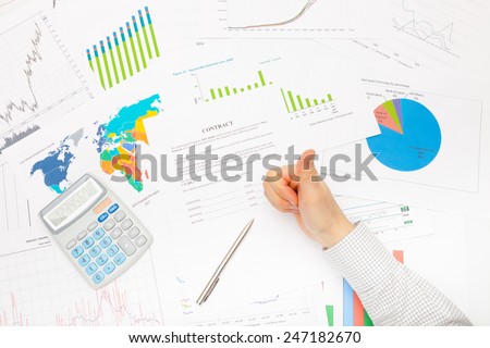 Business man working with financial data - ready to sing contract - thumb up