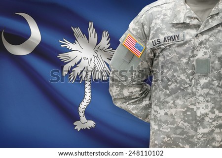 American soldier with US state flag on background - South Carolina