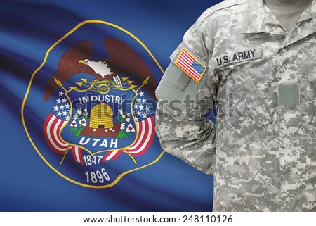 American soldier with US state flag on background - Utah