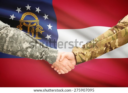 Soldiers handshake and US state flag - Georgia