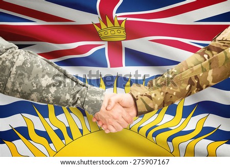 Soldiers handshake and Canadian province flag - British Columbia