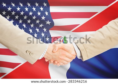 Businessmen shaking hands - United States and Dominican Republic