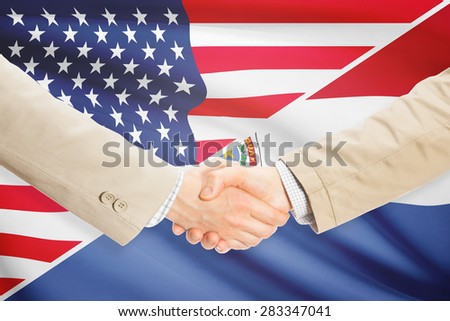 Businessmen shaking hands - United States and Paraguay
