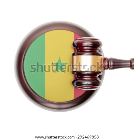 National legal system concept with flag on sound block  - Senegal