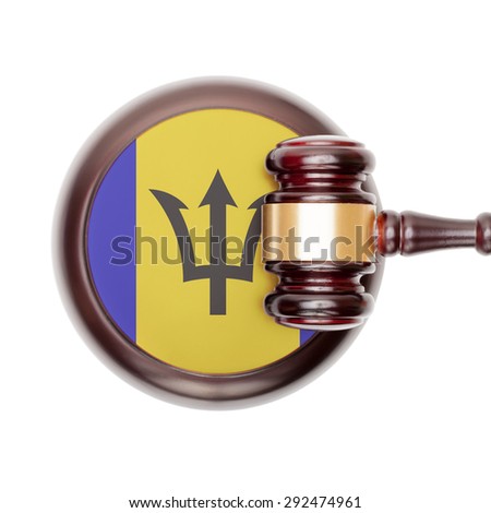 National legal system concept with flag on sound block  - Barbados