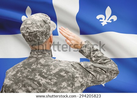 Soldier saluting to Canadial province flag conceptual series - Quebec