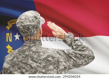 Soldier saluting to USA state flag conceptual series - North Carolina
