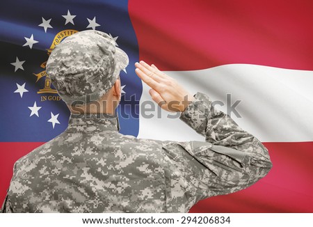 Soldier saluting to USA state flag conceptual series - Georgia