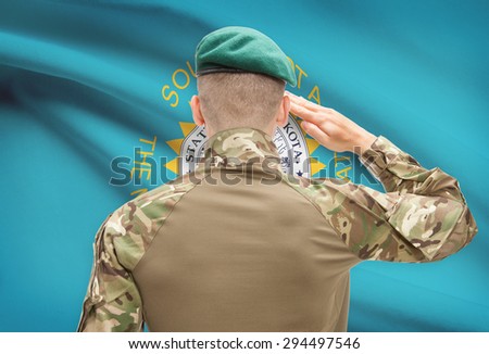 Soldier saluting to US state flag series - South Dakota