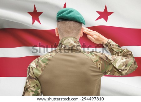 Soldier saluting to US state flag series - District of Columbia