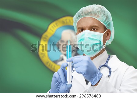 Doctor with syringe in hands and USA states flags on background - Washington