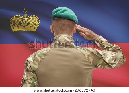Dark-skinned soldier in hat facing national flag series - Liechtenstein