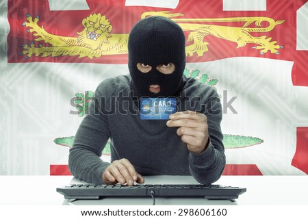 Dark-skinned hacker with credit card and Canadian province flag on background - Prince Edward Island